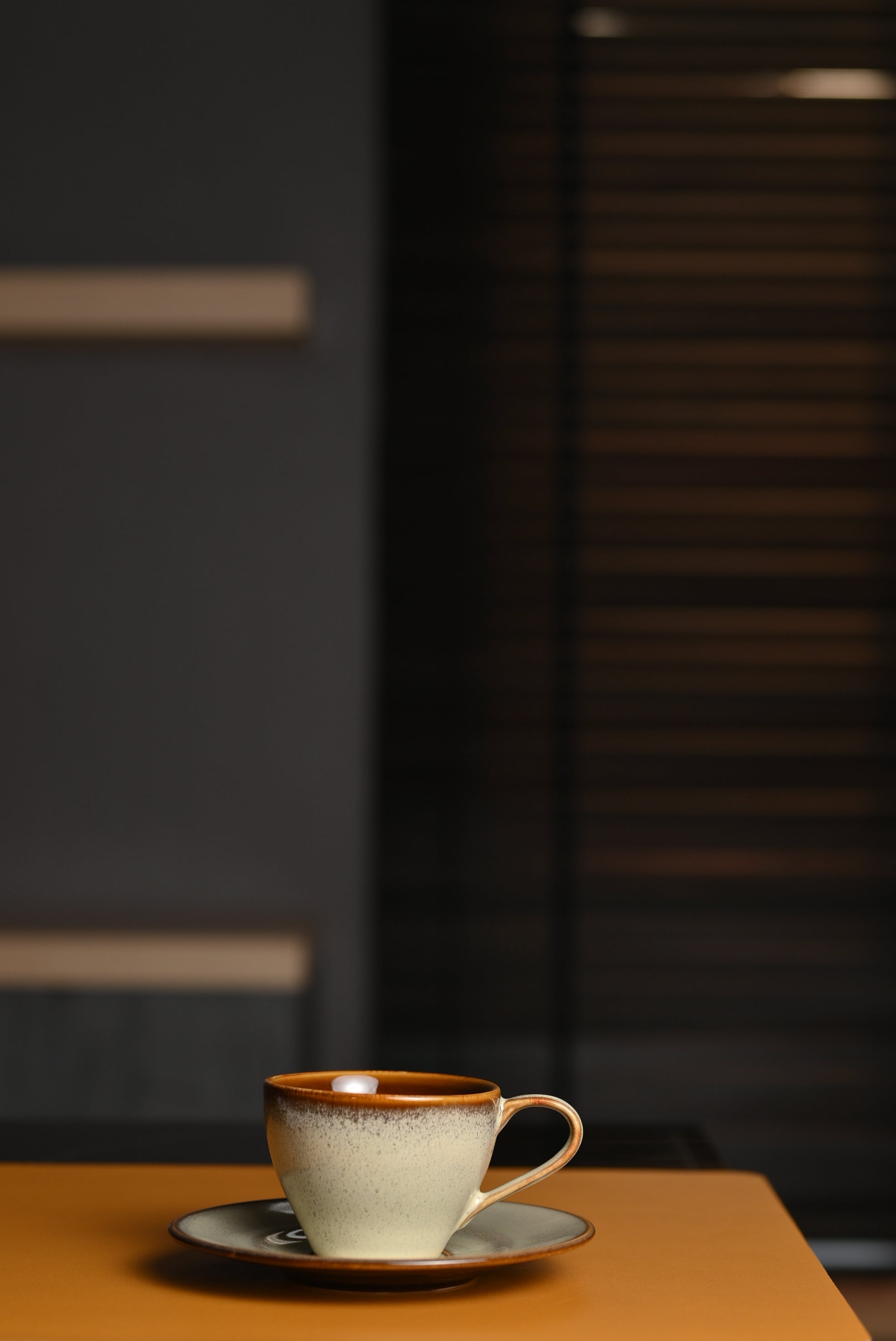 Brown Espresso Cup with a Saucer